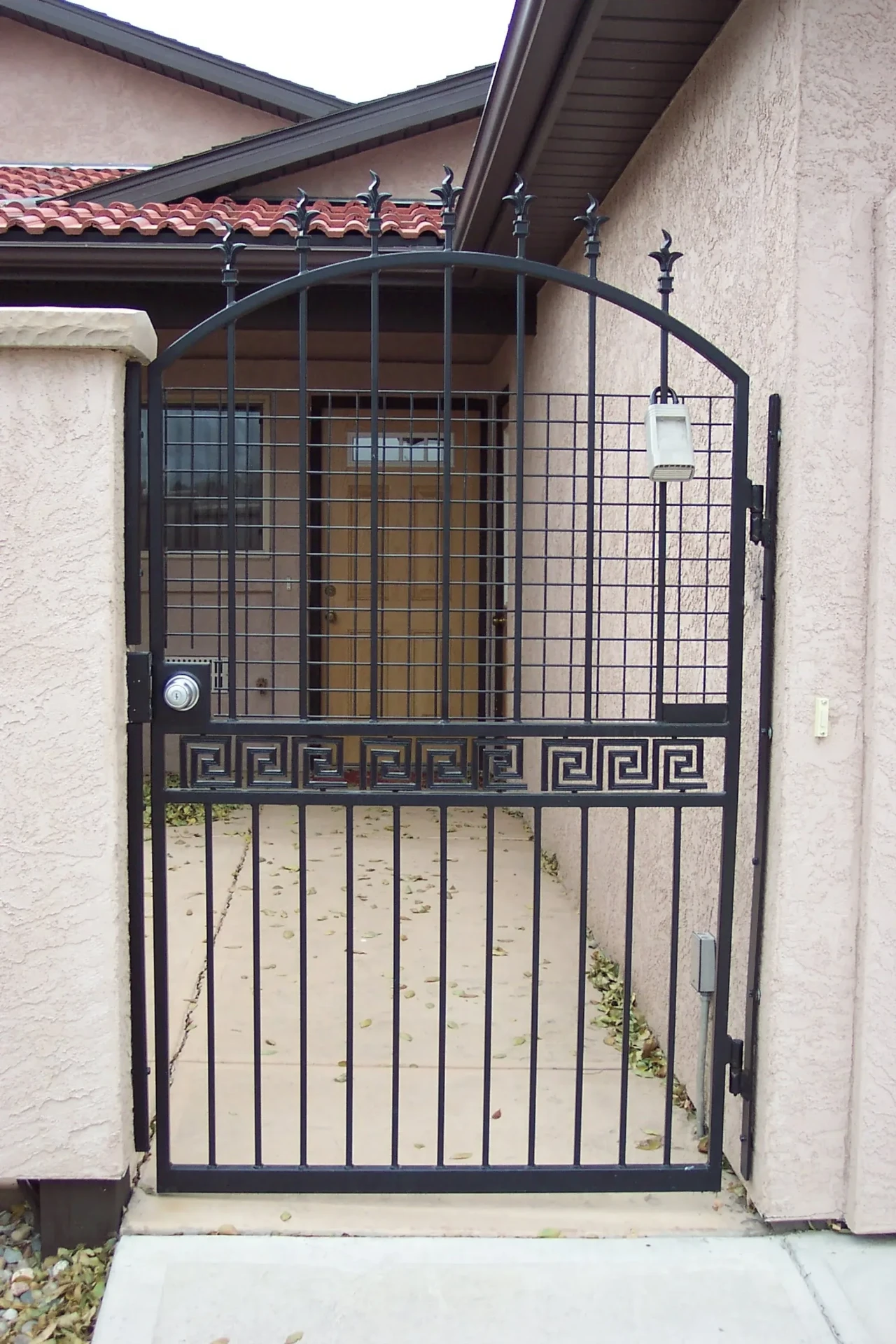 Custom Arched Courtyard Iron — Gate