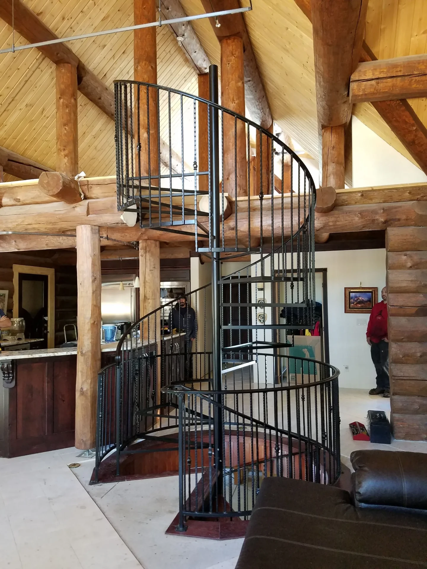 Custom Log Home Spiral — Staircase