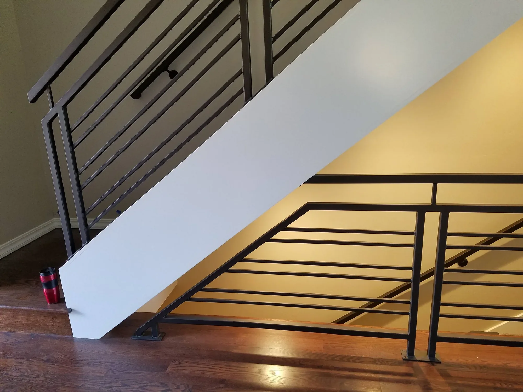 Custom Understair Horizontal Railing — Staircase