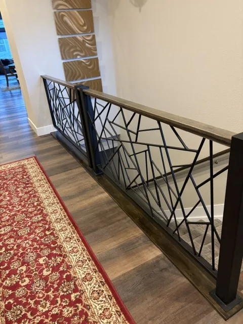 Custom Black Geometric Iron Staircase Railing — Staircase