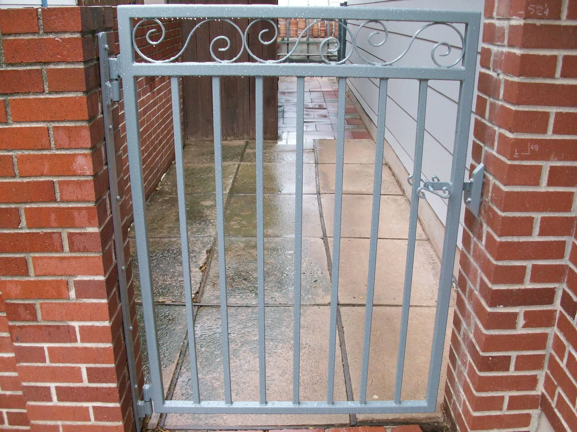 Custom Iron Brick Entry — Gate