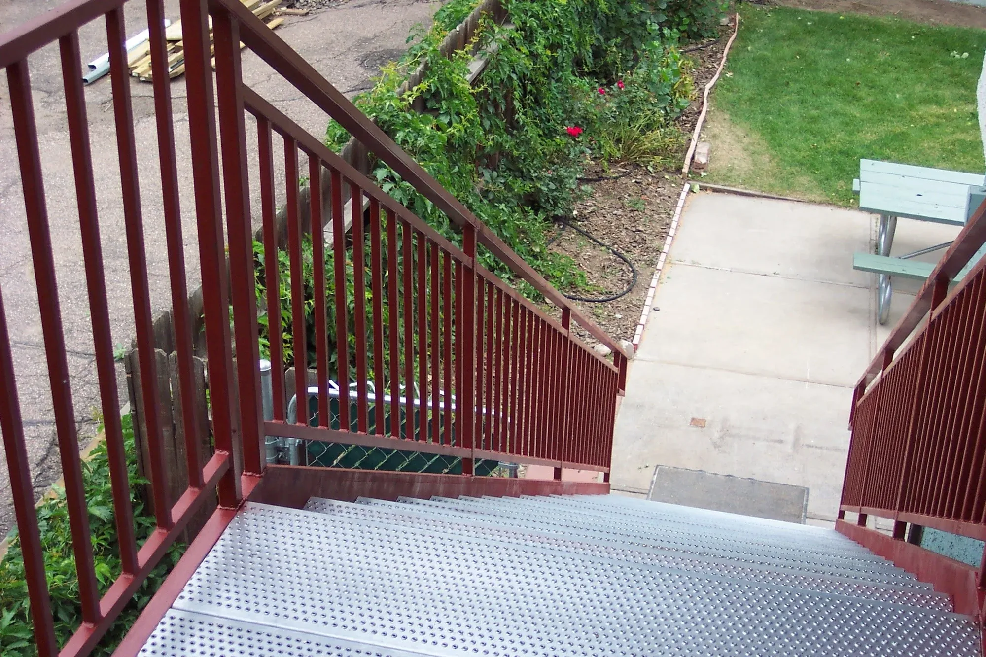 Custom Red Steel Grated Landing — Staircase