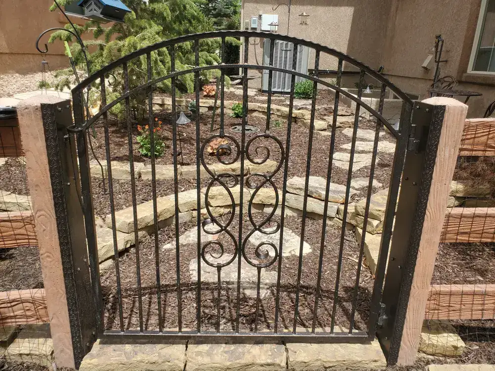 Decorative wrought iron entry gate