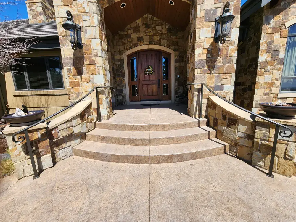 Decorative Iron Railing on Stone Entryway