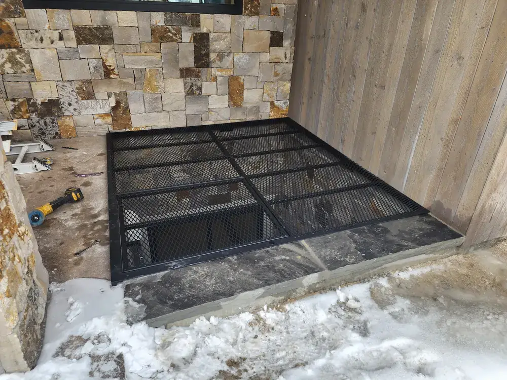 Modern window well guard installed detail
