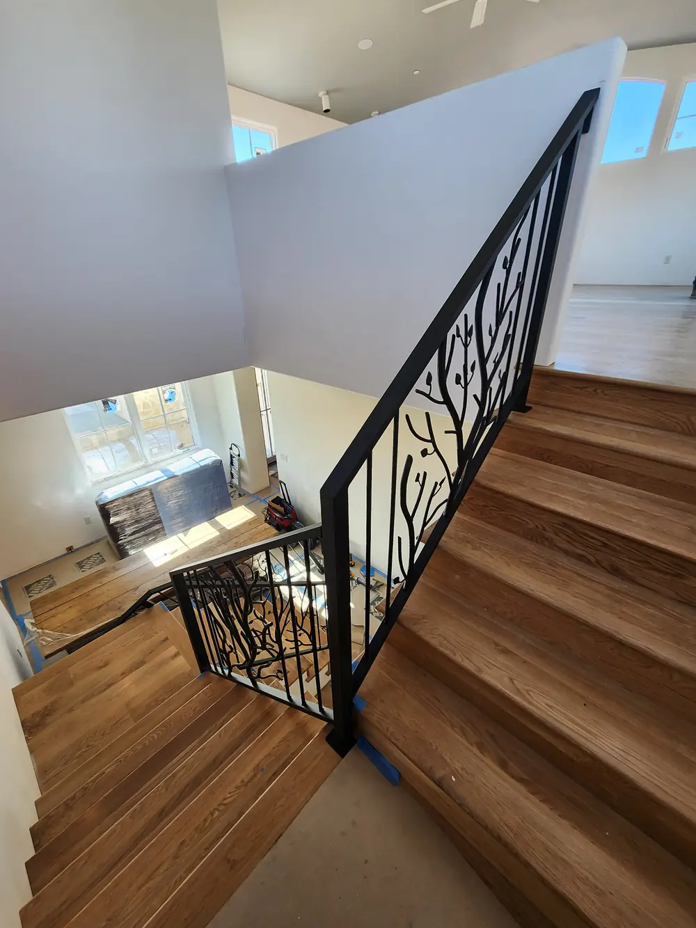 Modern interior iron stair railing fabricated for a Colorado Springs architect
